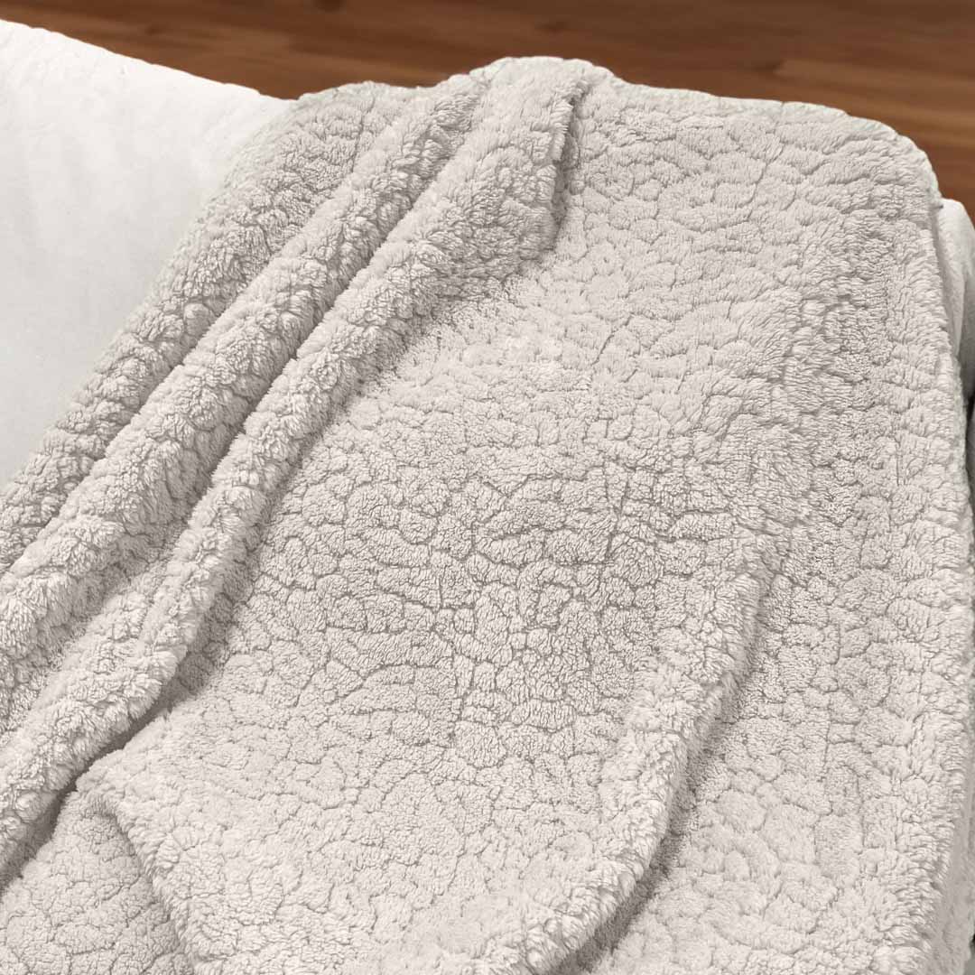 PLAID JACQUARD CON SHERPA BRIGITTE TINTA UNITA