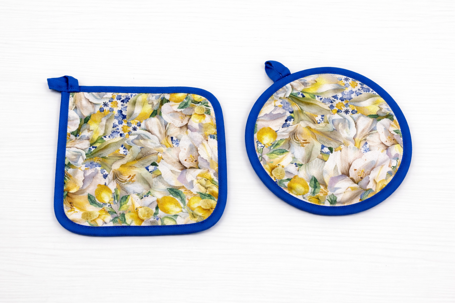 SET GREMBIULE CON PRESINE FANTASIA DIGITALE FLOREALE CON LIMONI SLING